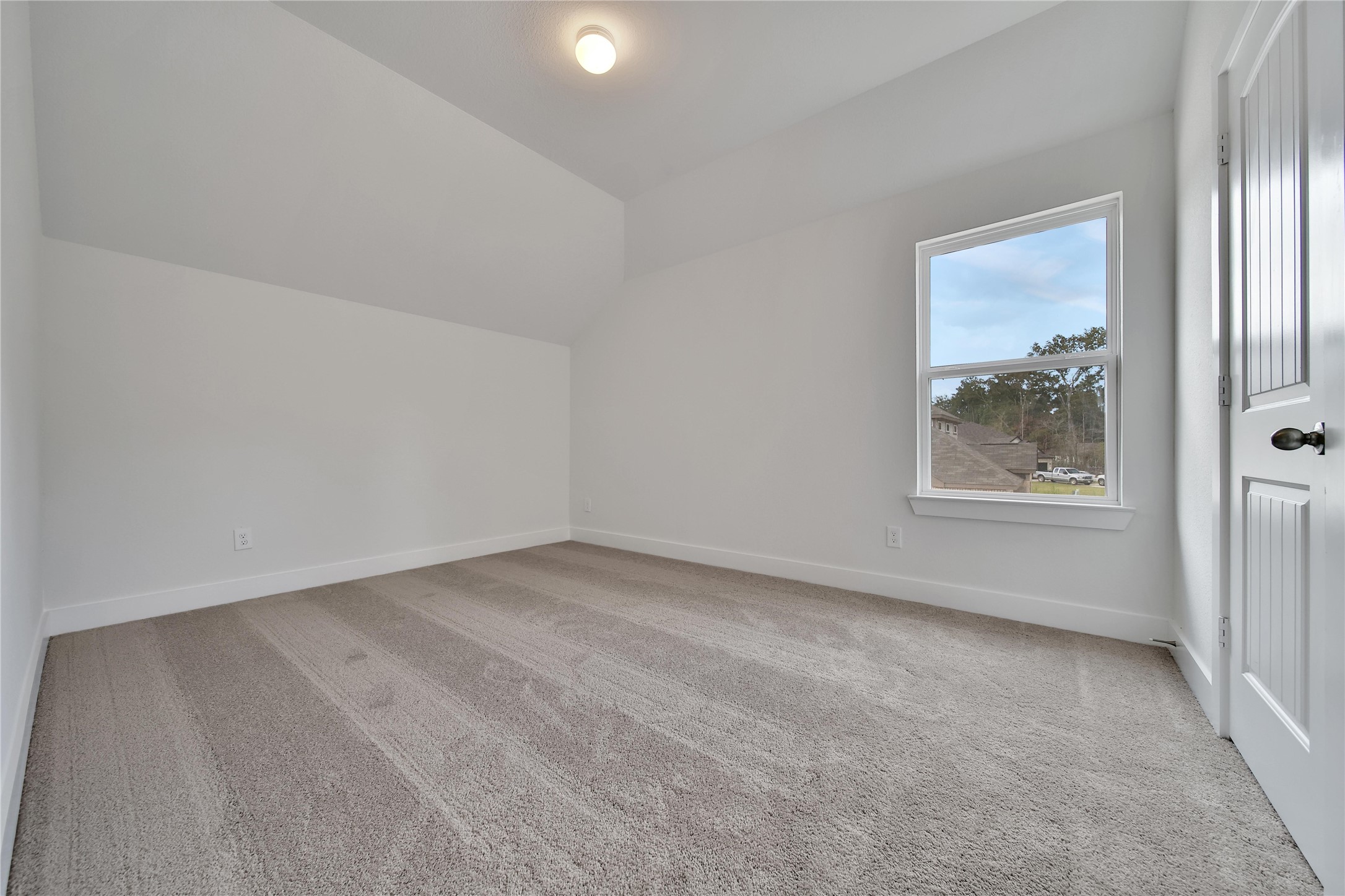 1003 Thor New Caney, TX 77357 - Photo 24 of 45 a view of an empty room with a window