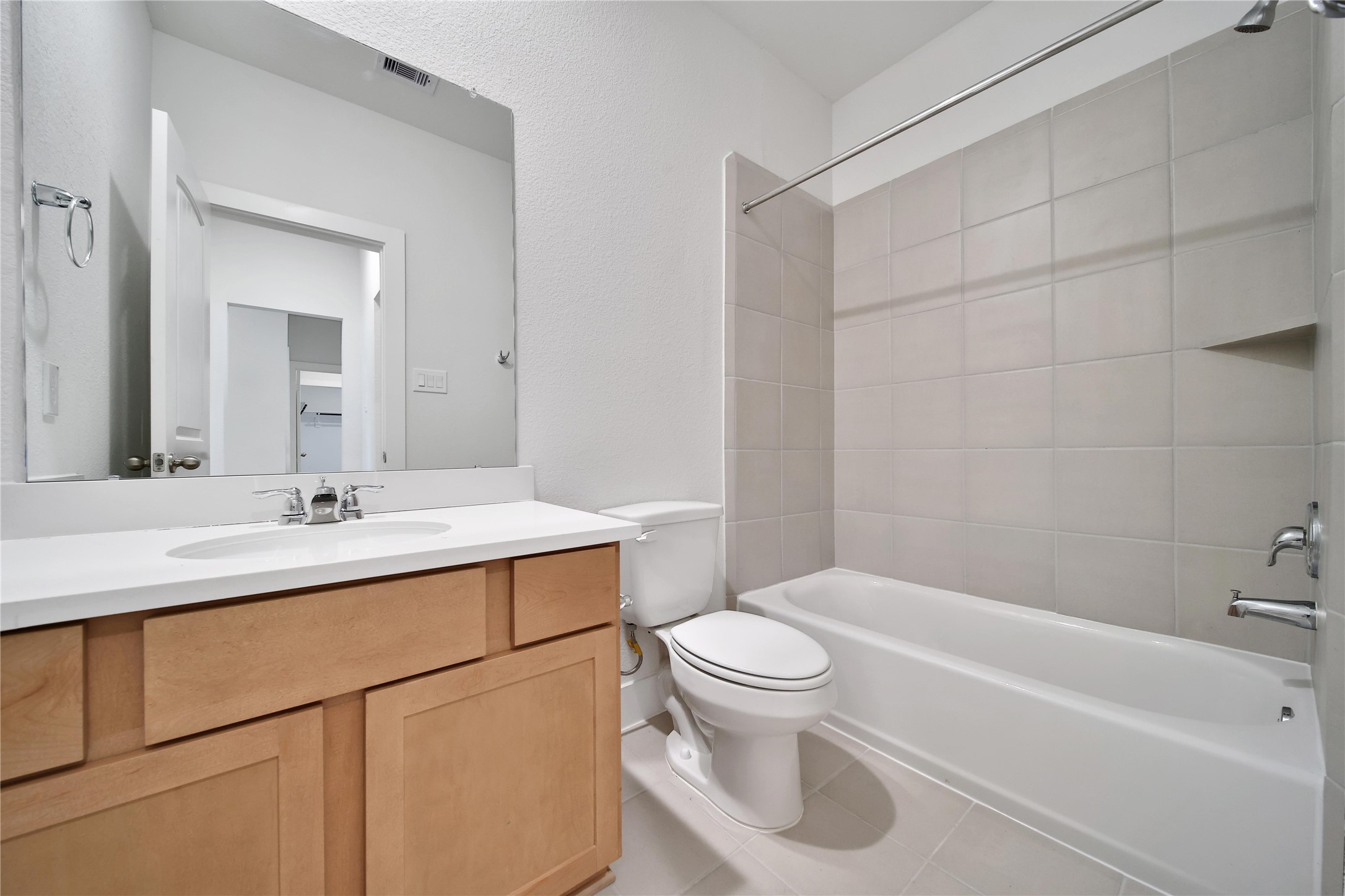 1003 Thor New Caney, TX 77357 - Photo 26 of 45 a bathroom with a sink toilet vanity and bathtub