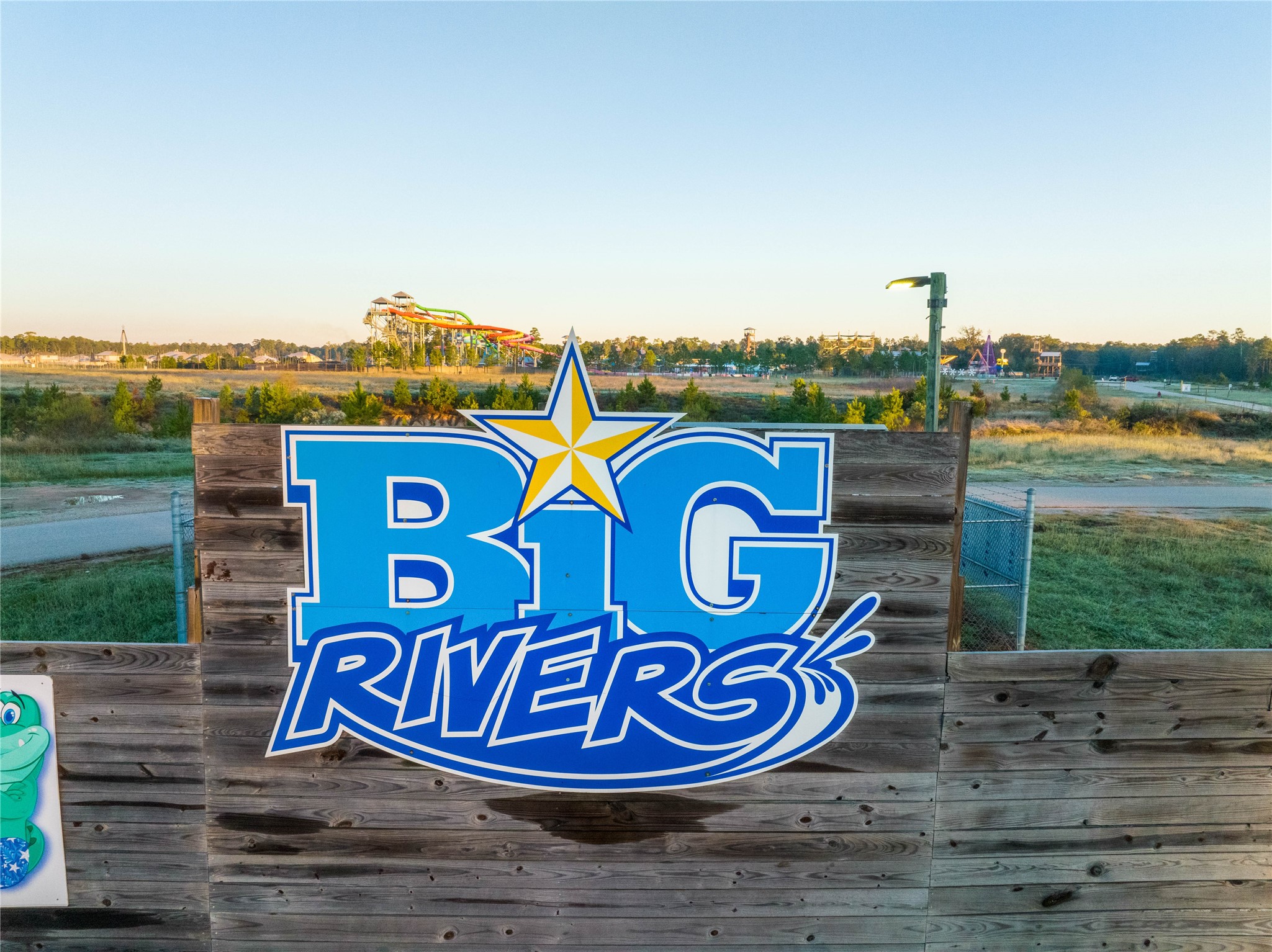 1003 Thor New Caney, TX 77357 - Photo 39 of 45 a sign that is on a brick wall with a view of lake