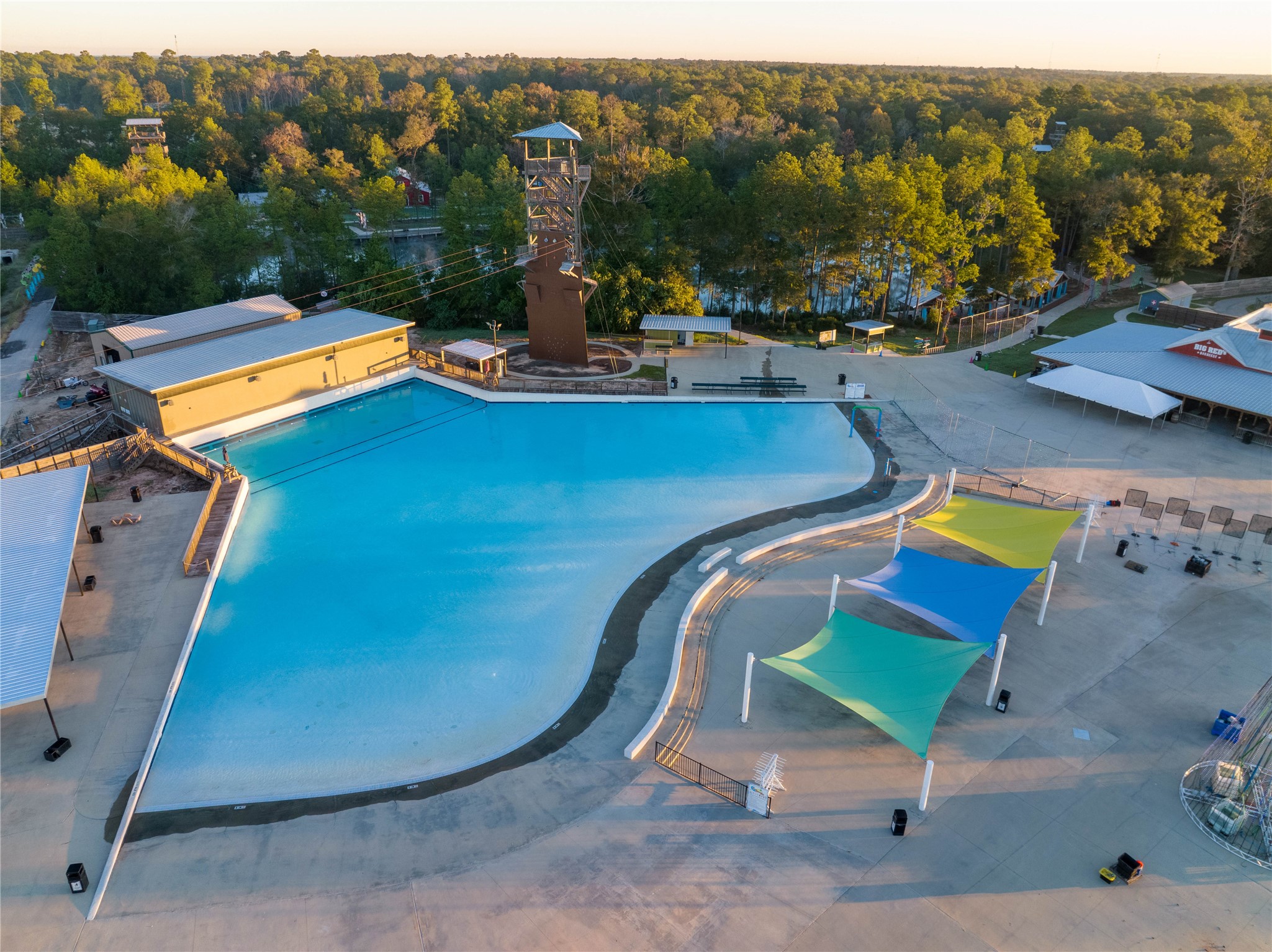 1003 Thor New Caney, TX 77357 - Photo 41 of 45 a view of a swimming pool with a yard and sitting area
