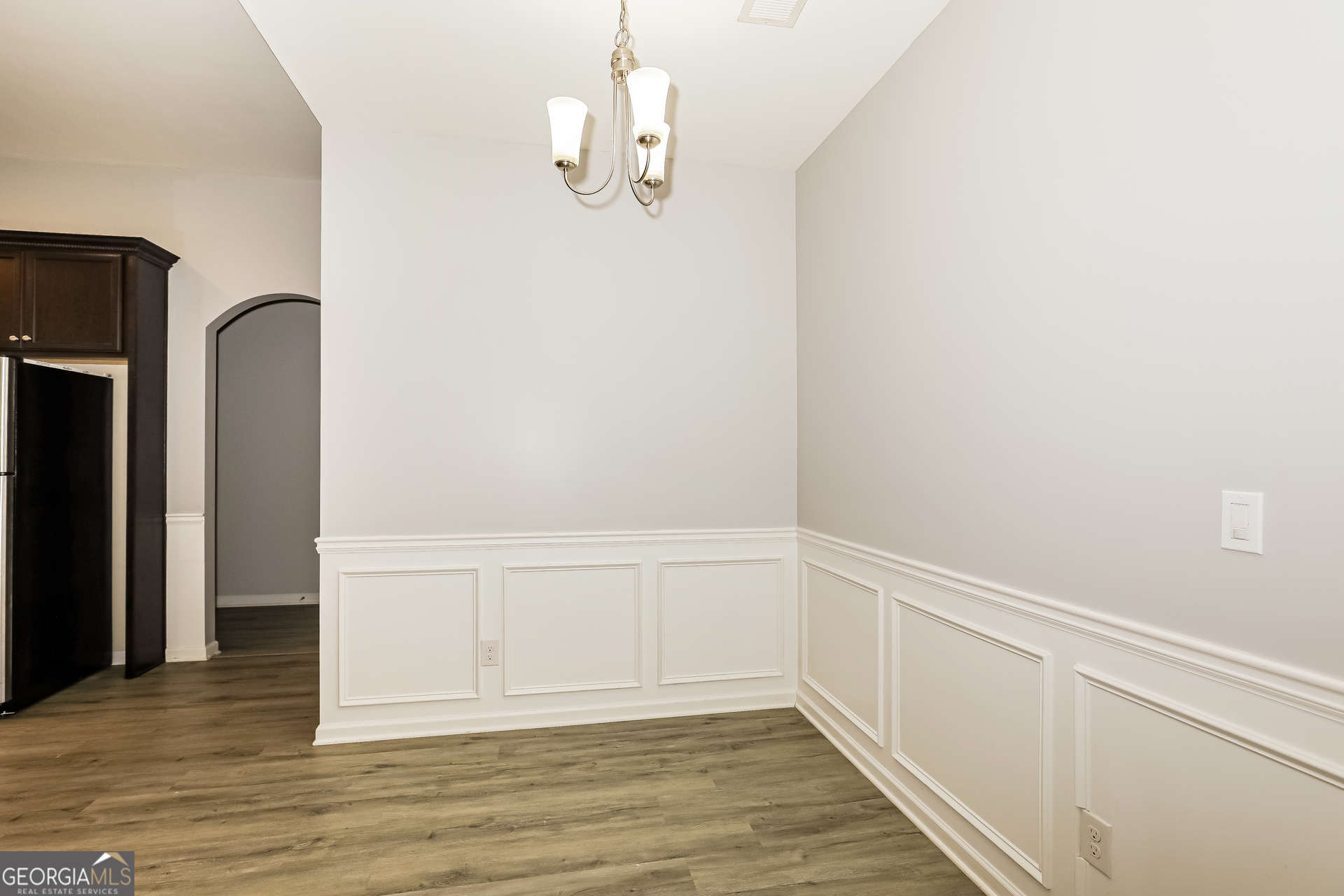 3216 Alhambra Circle Hampton, GA 30228 - Photo 6 of 21 a view of empty room with wooden floor