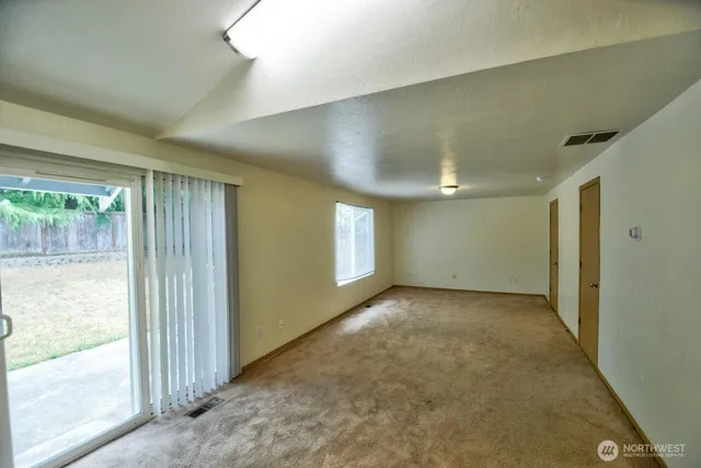 a view of livingroom and front door