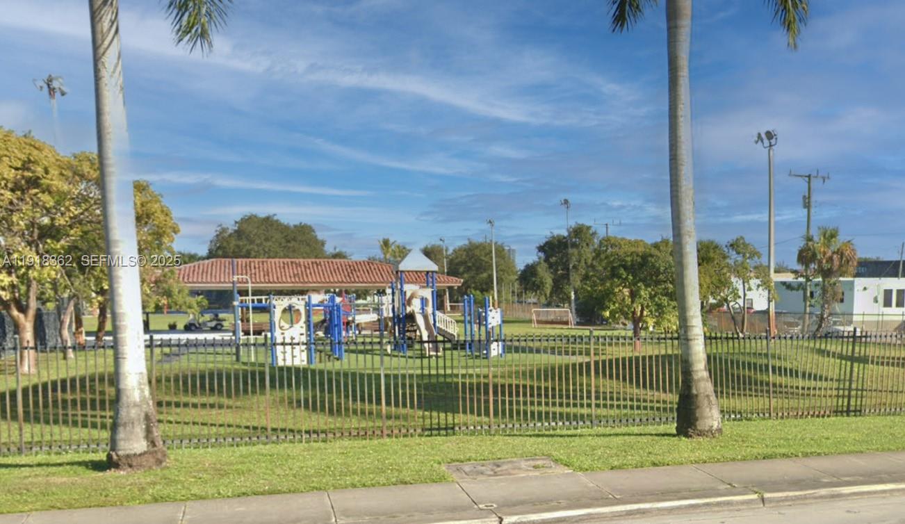 65 Northeast 59th Street, Unit 3 Miami, FL 33137 - Photo 9 of 10 a view of a park with a large trees