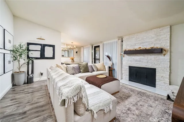 a view of a dining room with a table and chairs
