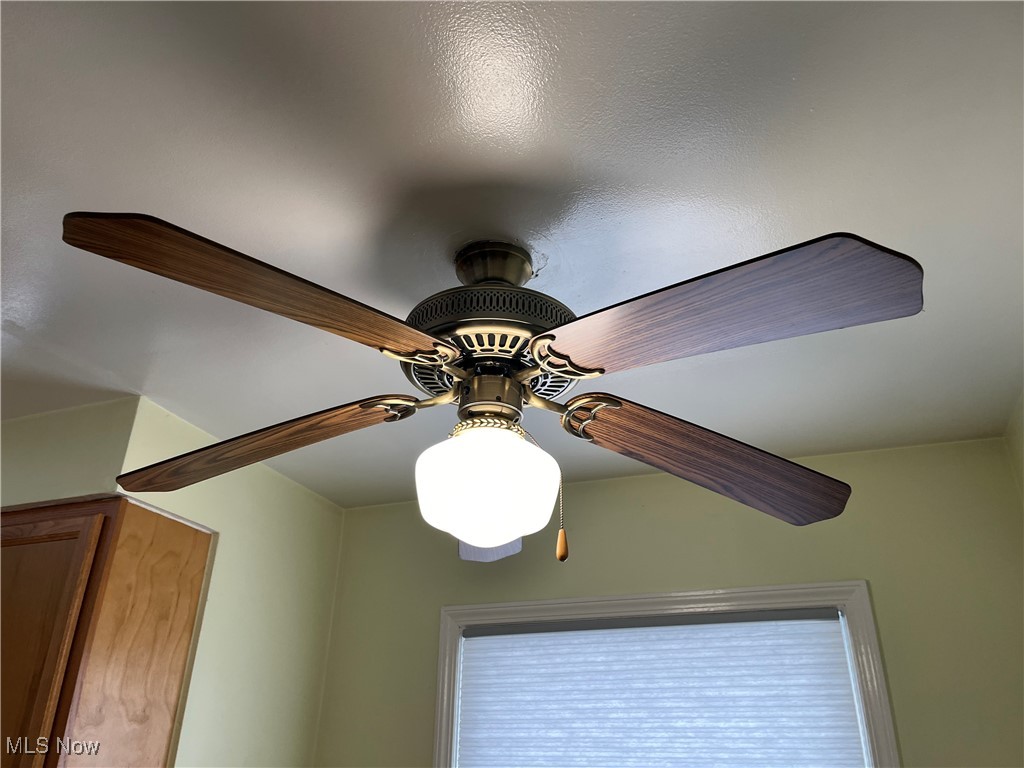 15405 Corkhill Road Maple Heights, OH 44137 - Photo 14 of 50 Ceiling Fan Light over the Eating Area in the Kitchen