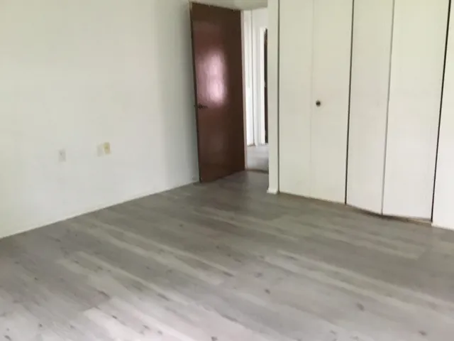 a bathroom with a window and a sink