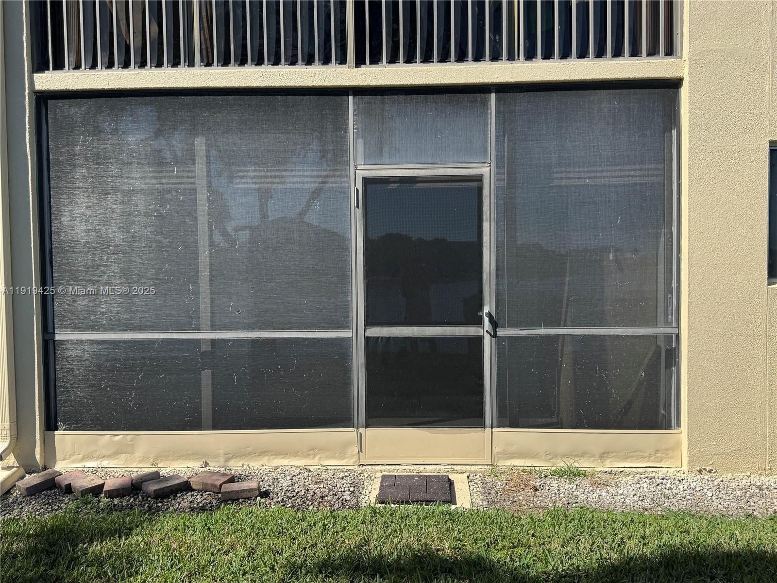 1001 Southwest 141st Avenue, Unit 107K Pembroke Pines, FL 33027 - Photo 24 of 28 a view of wooden door