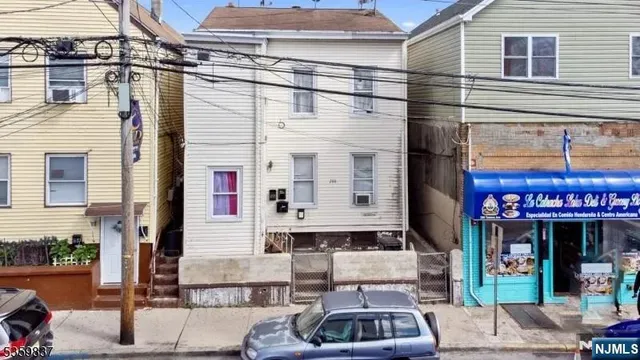 a front view of a building with street