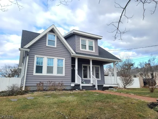a view of a yard in front of a house