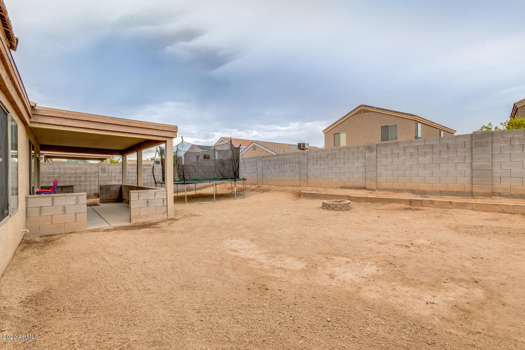 12714 West Calavar Road El Mirage, AZ 85335 - Photo 21 of 24 a view of a house with a outdoor space