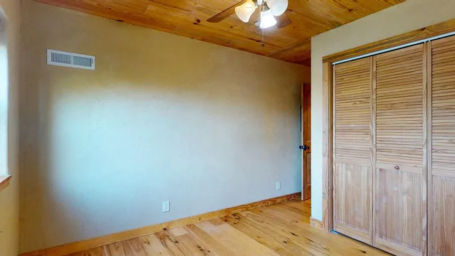 a view of an empty room and window