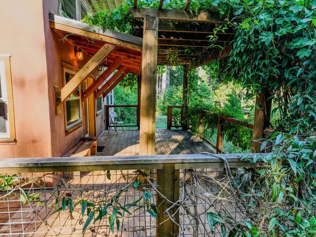 a aerial view of a house with a yard