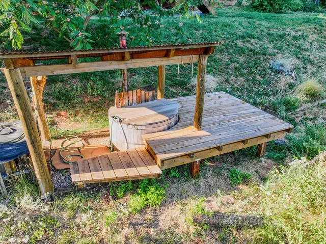 a backyard of a house with lots of green space