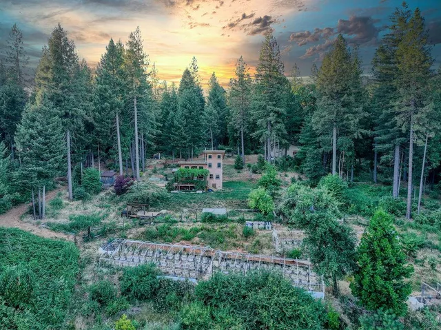 a view of a kitchen with a sink and cabinets