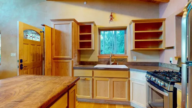 a view of a balcony with wooden floor