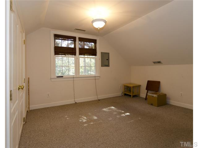 1324 Canterbury Road Raleigh, NC 27608 - Photo 12 of 16 Upstairs bonus room with additional storage areas. Bonus Room