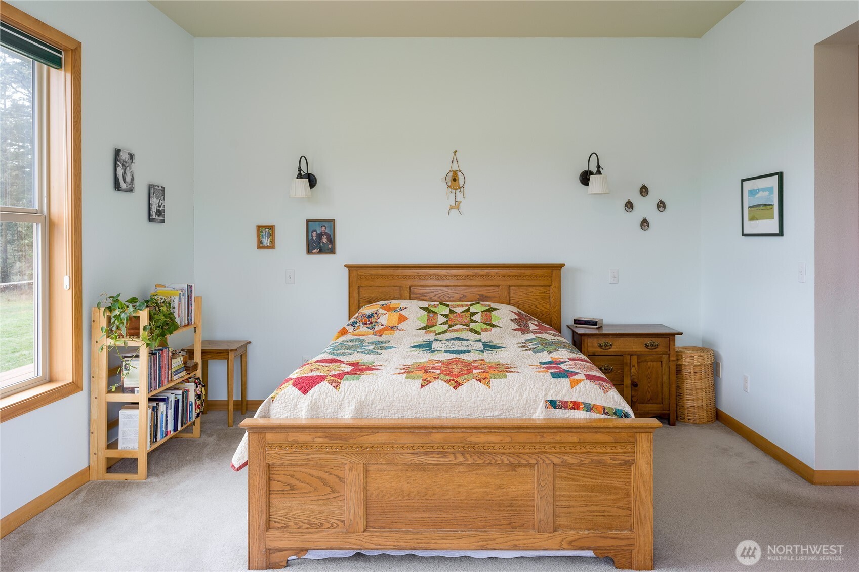 110 Clay Hill Road Lopez Island, WA 98261 - Photo 13 of 35 a bed sitting in a bedroom next to a window