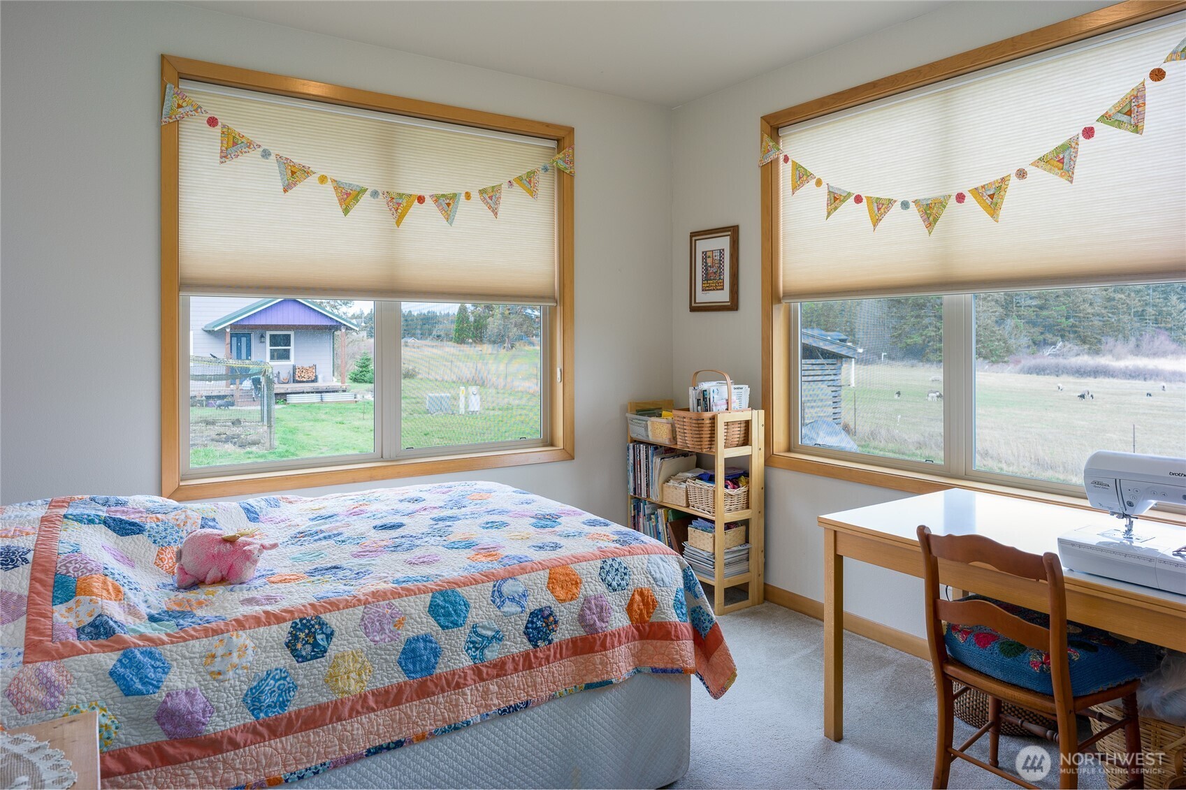 110 Clay Hill Road Lopez Island, WA 98261 - Photo 16 of 35 a bedroom with a bed and a table