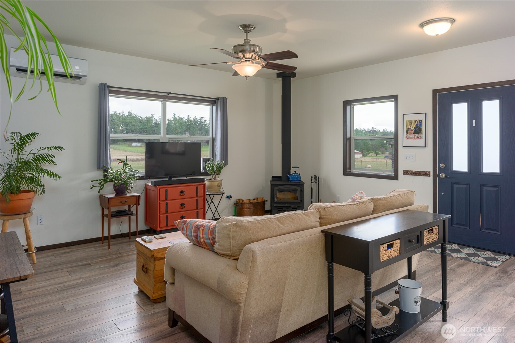 110 Clay Hill Road Lopez Island, WA 98261 - Photo 21 of 35 a living room with furniture and a large window