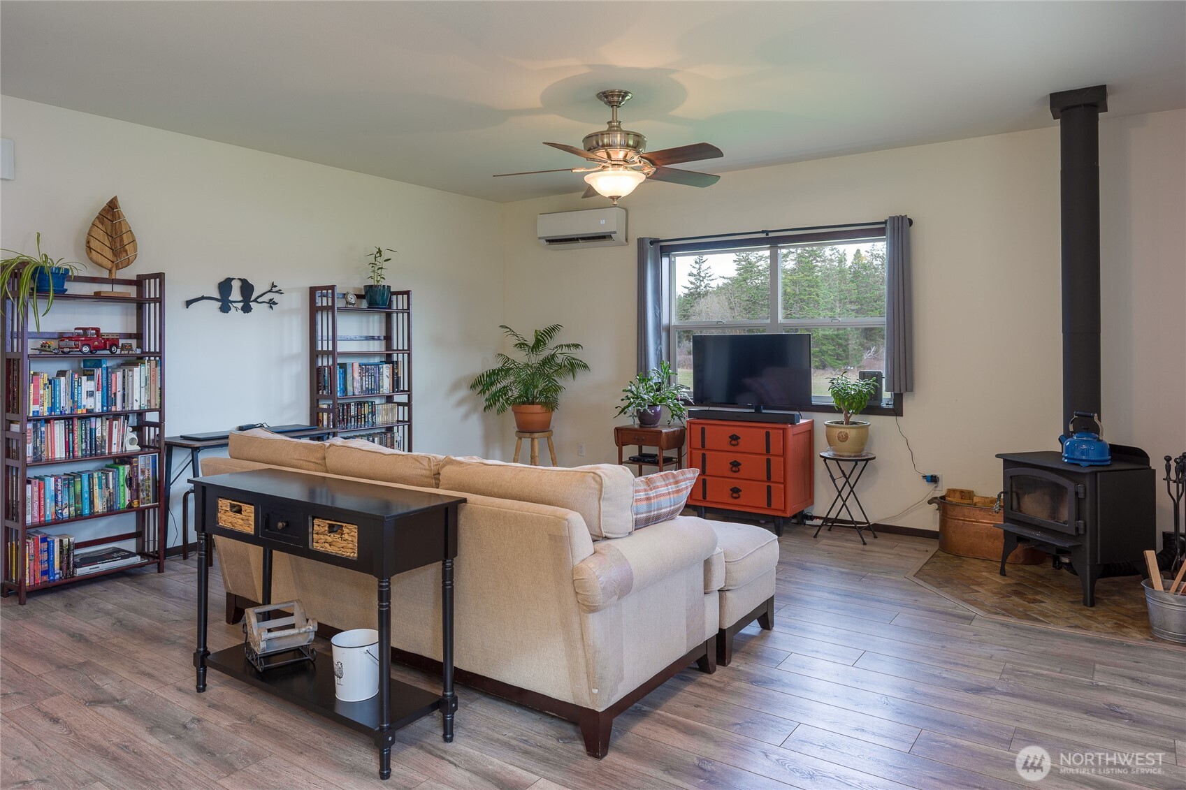 110 Clay Hill Road Lopez Island, WA 98261 - Photo 22 of 35 a living room with furniture and a flat screen tv