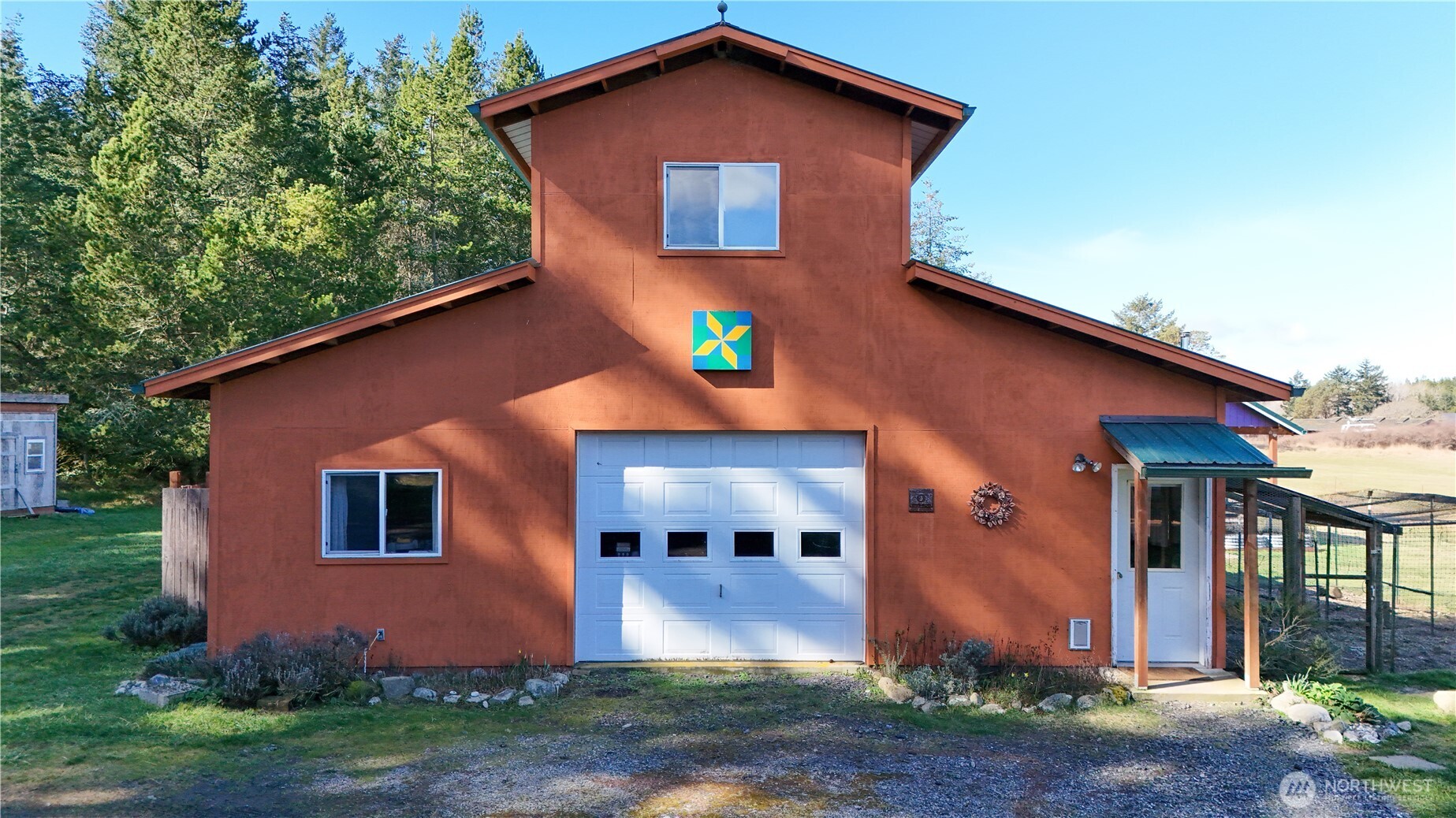 110 Clay Hill Road Lopez Island, WA 98261 - Photo 28 of 35 a view of a house with yard and plants