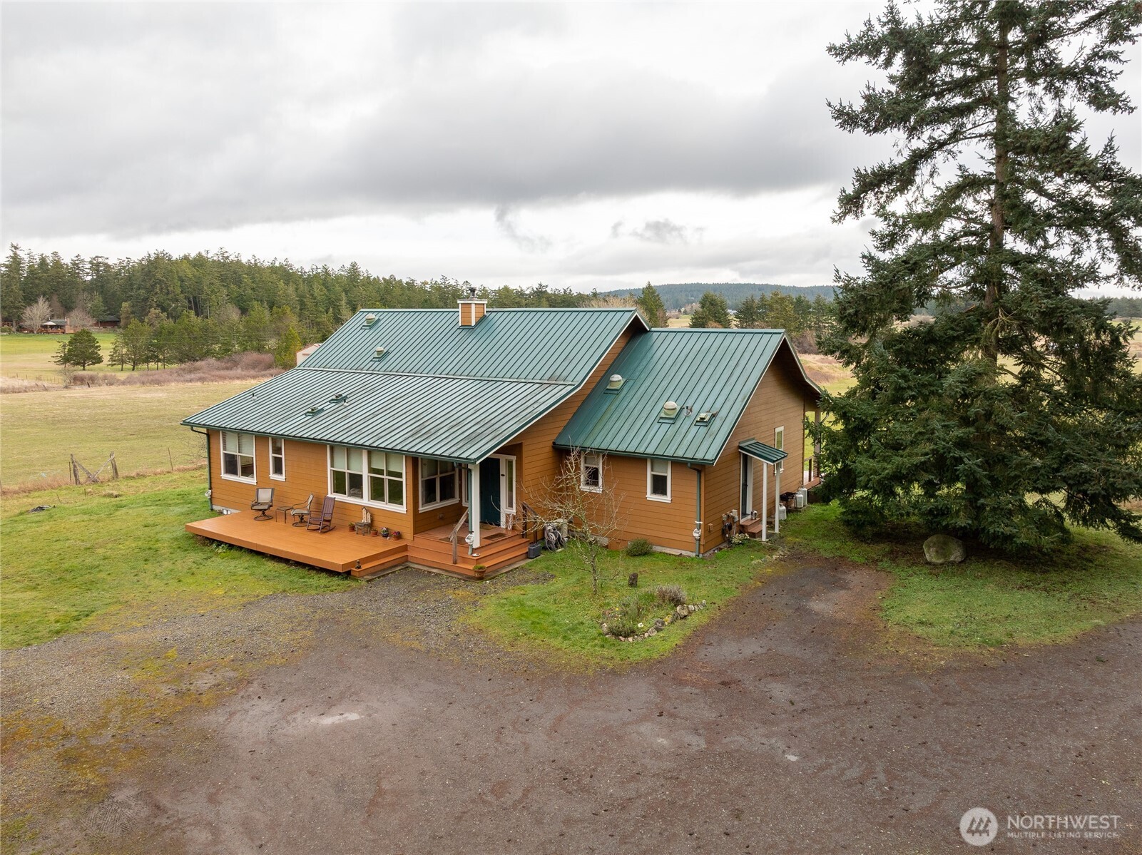 110 Clay Hill Road Lopez Island, WA 98261 - Photo 32 of 35 an aerial view of a house with a big yard