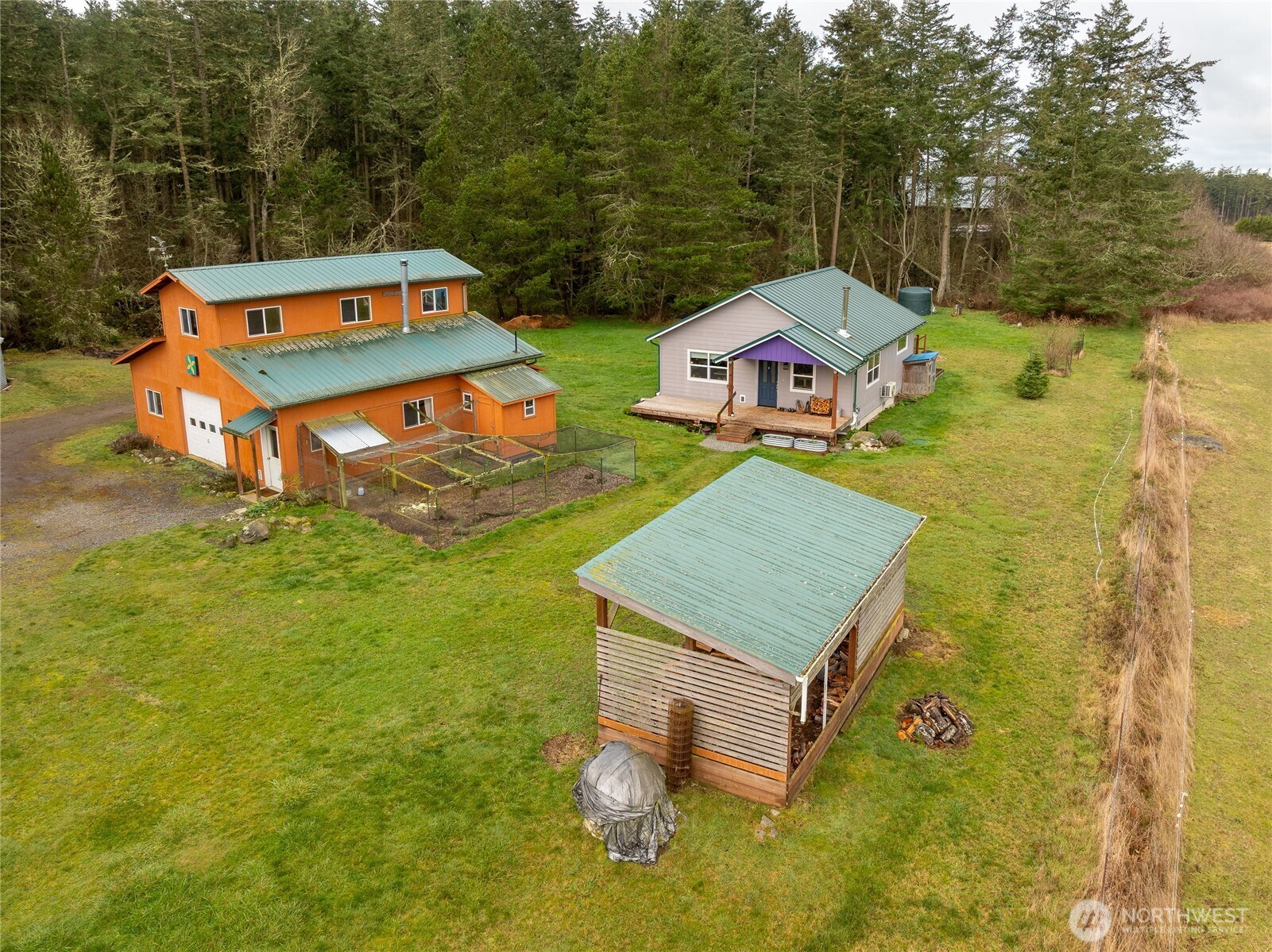 110 Clay Hill Road Lopez Island, WA 98261 - Photo 33 of 35 aerial view of a house with swimming pool