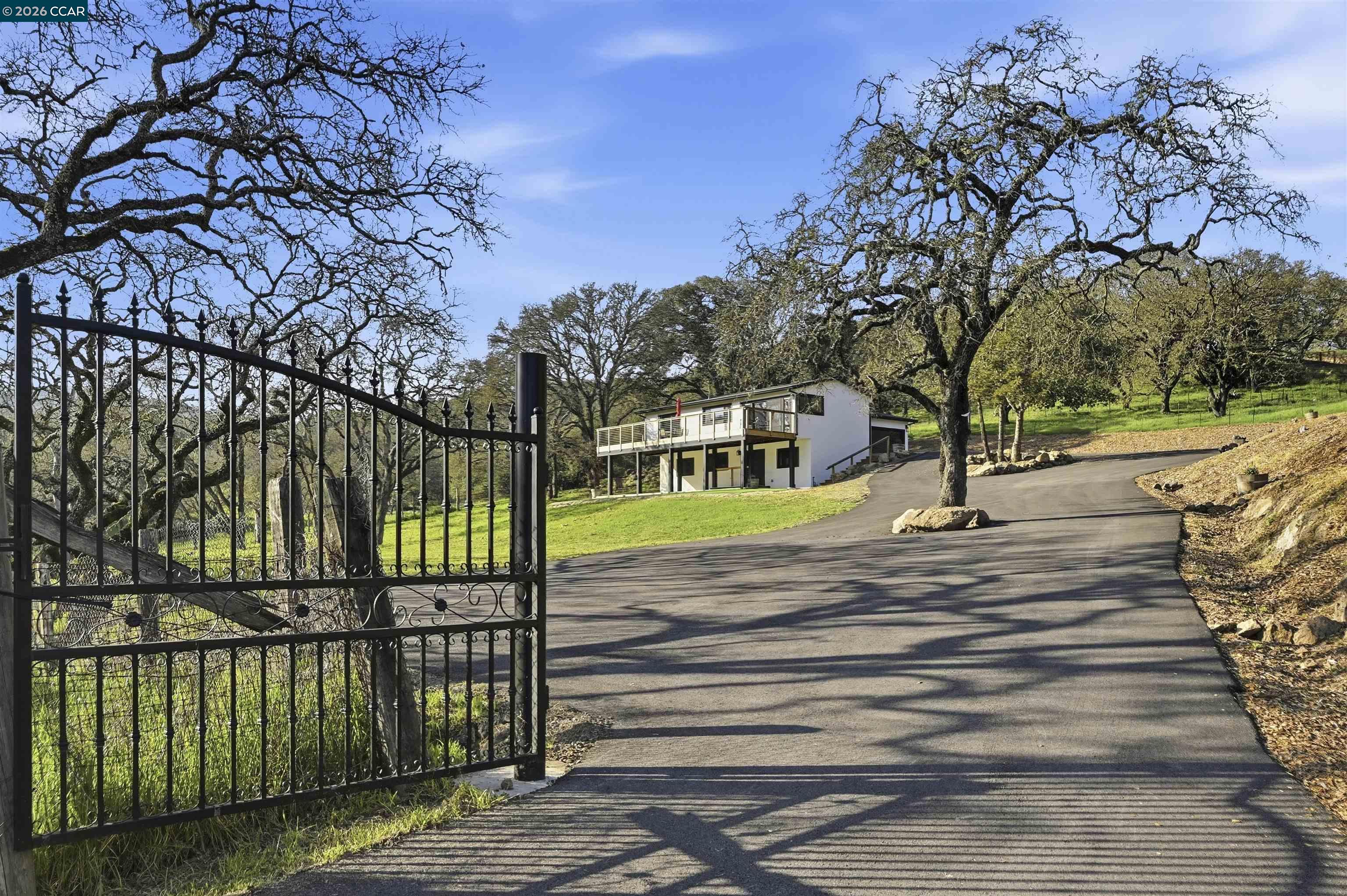 2087 First Avenue Napa, CA 94558 - Photo 1 of 1 a view of a yard with plants and trees