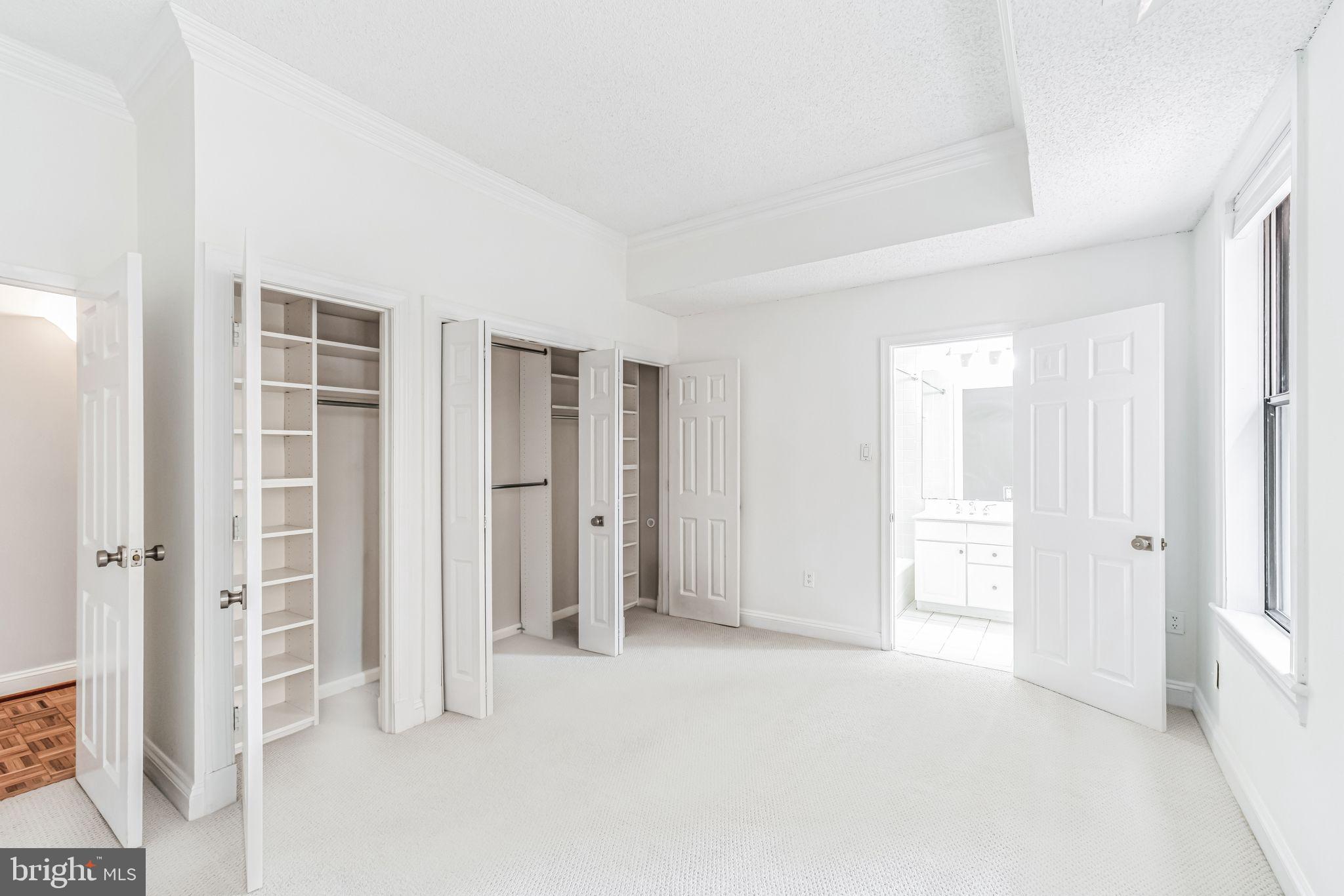 2123 California Street Northwest, Unit C6 Washington, DC 20008 - Photo 18 of 32 Primary bedroom with ensuite bath, custom closets