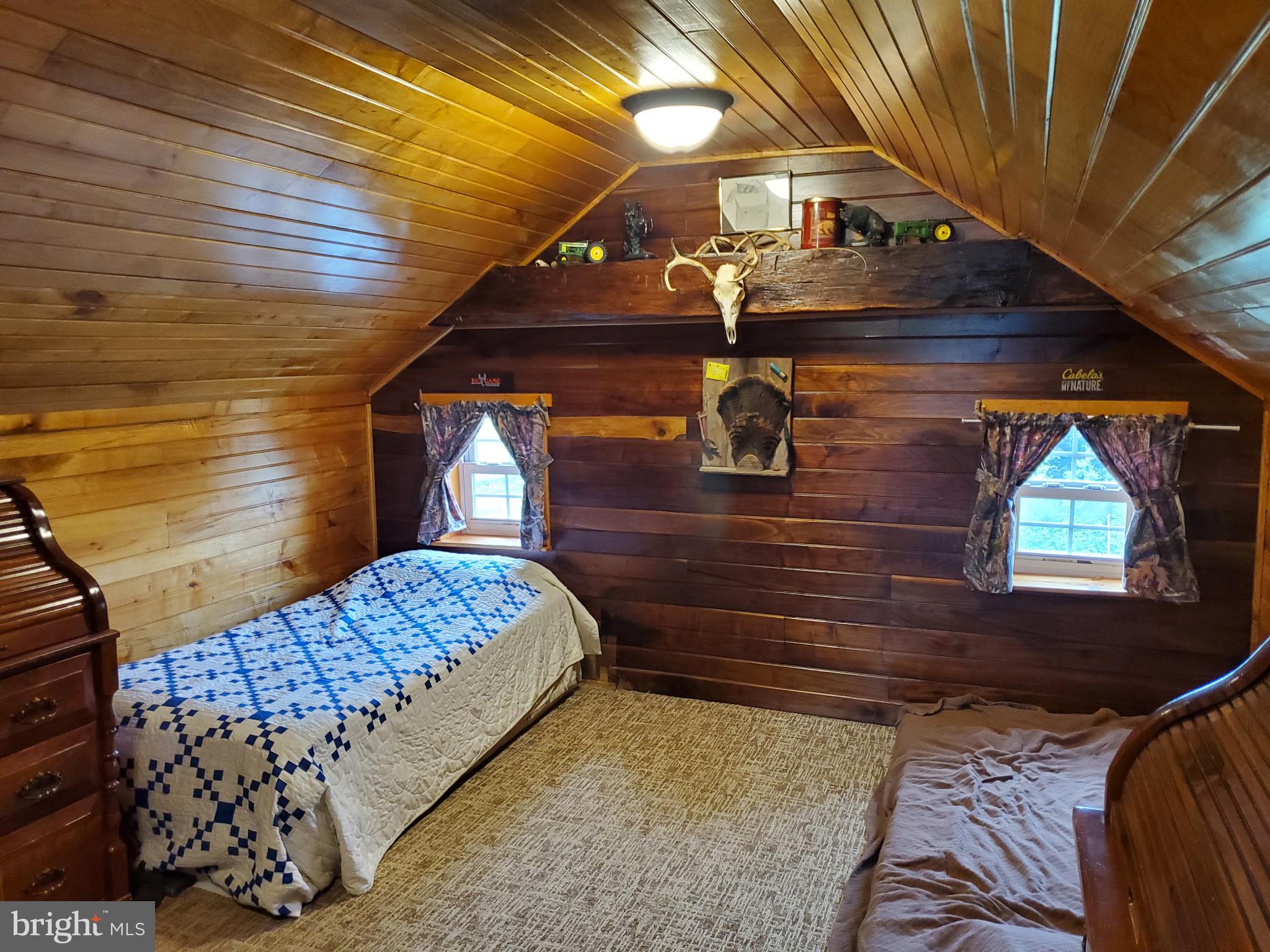 21 Greble Road Myerstown, PA 17067 - Photo 24 of 32 Cozy attic retreat with rustic charm.