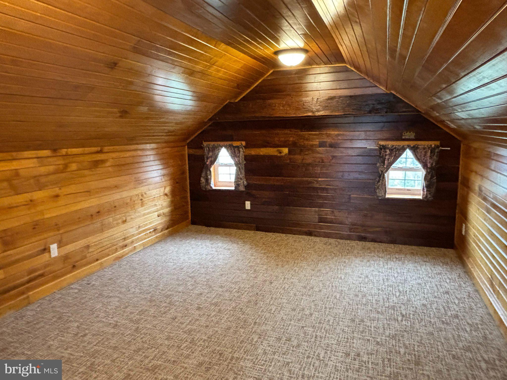 21 Greble Road Myerstown, PA 17067 - Photo 25 of 32 Cozy attic retreat with wooden charm.