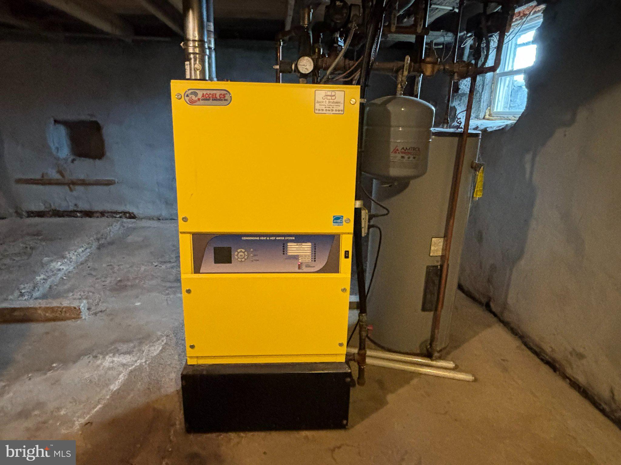 21 Greble Road Myerstown, PA 17067 - Photo 27 of 32 Bright yellow heating system in basement.