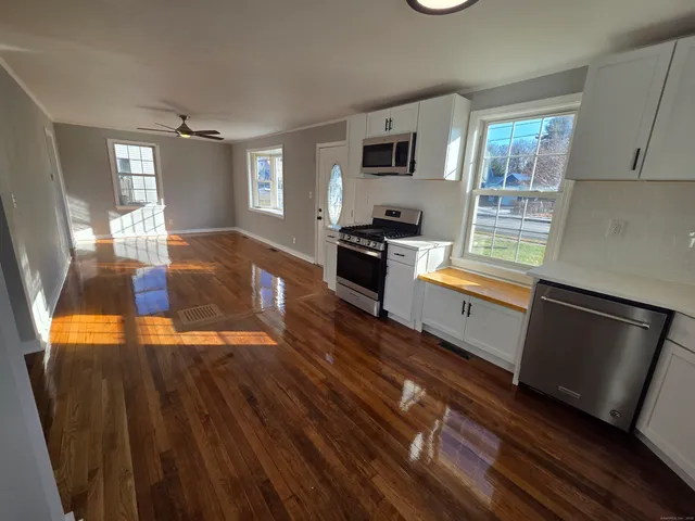 a bathroom with a sink and toilet