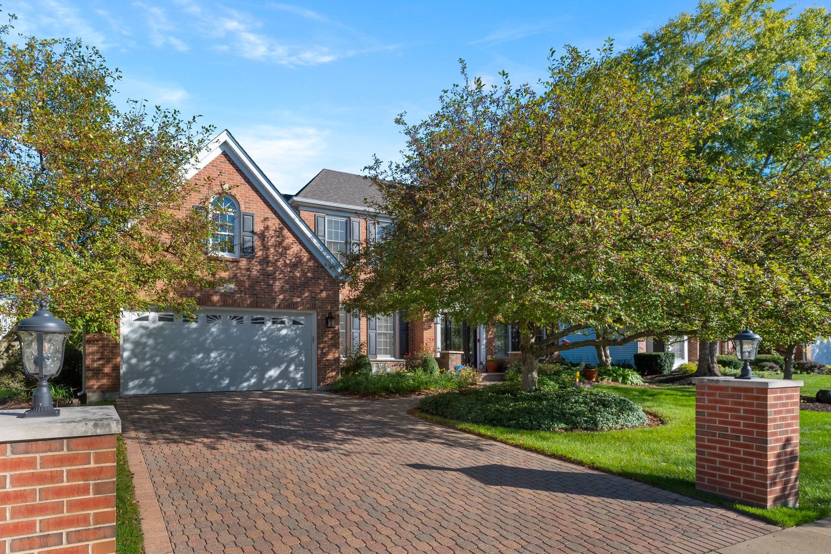 2527 Wild Timothy Road Naperville, IL 60564 - Photo 2 of 38 a front view of a house with a garden
