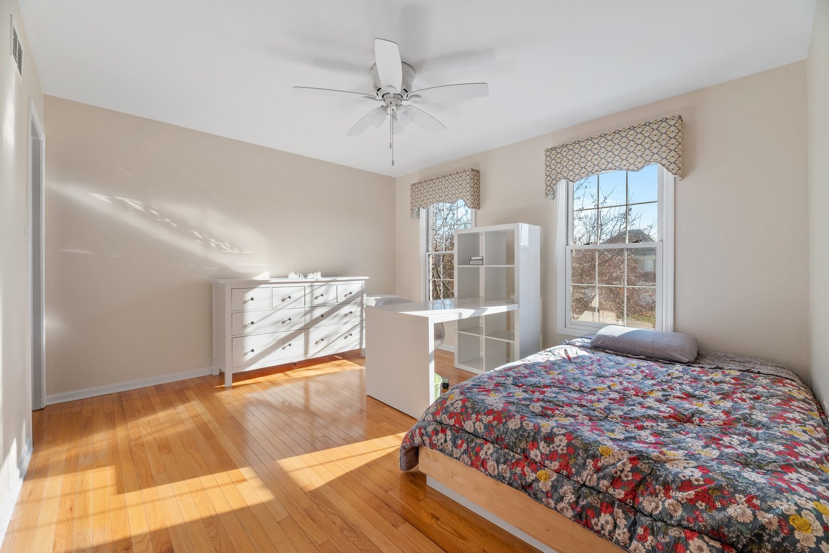2527 Wild Timothy Road Naperville, IL 60564 - Photo 23 of 38 a bedroom with a bed and a window