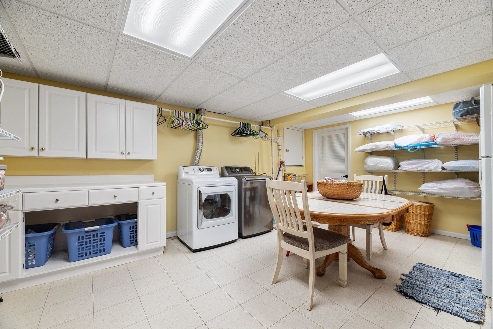 2527 Wild Timothy Road Naperville, IL 60564 - Photo 28 of 38 a kitchen with a stove a table and chairs in it