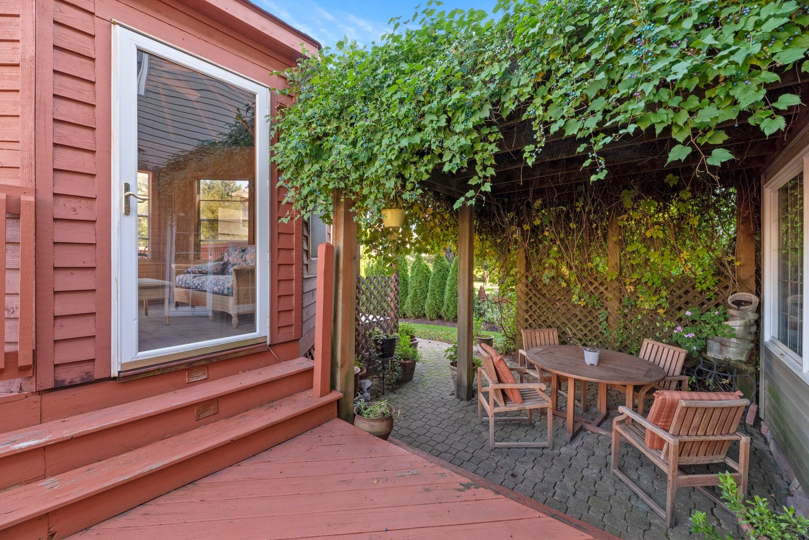 2527 Wild Timothy Road Naperville, IL 60564 - Photo 31 of 38 a view of a patio with a table and chairs and couches