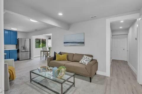 110 North Hillside Street Red Oak, TX 75154 - Photo 6 of 25 Living room with recessed lighting and light wood-style flooring