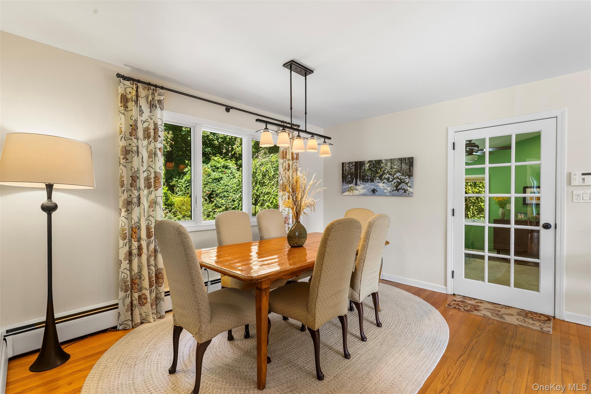 507 Croton Lake Road Bedford Corners, NY 10549 - Photo 12 of 39 a dining room with furniture window and wooden floor