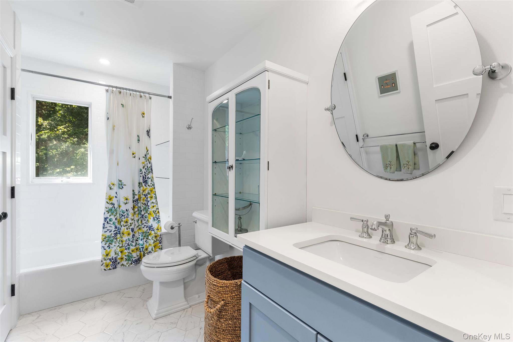 507 Croton Lake Road Bedford Corners, NY 10549 - Photo 18 of 39 a bathroom with a sink a toilet and a mirror