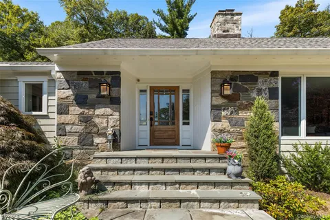 a front view of a house with a porch