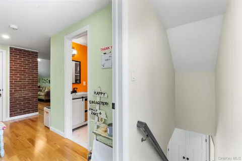 a view of backyard of house with seating space