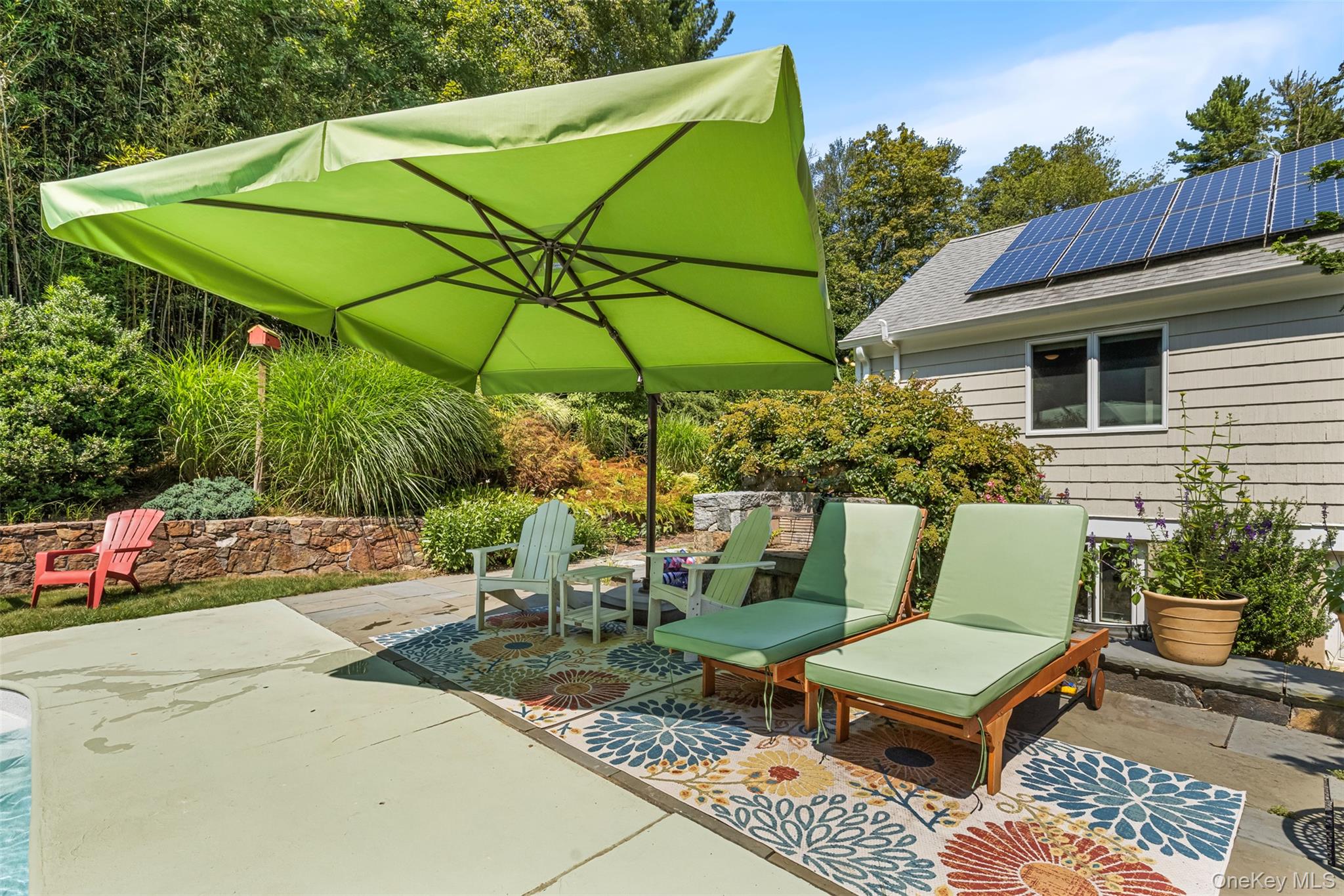 507 Croton Lake Road Bedford Corners, NY 10549 - Photo 27 of 39 a view of backyard of house with seating space