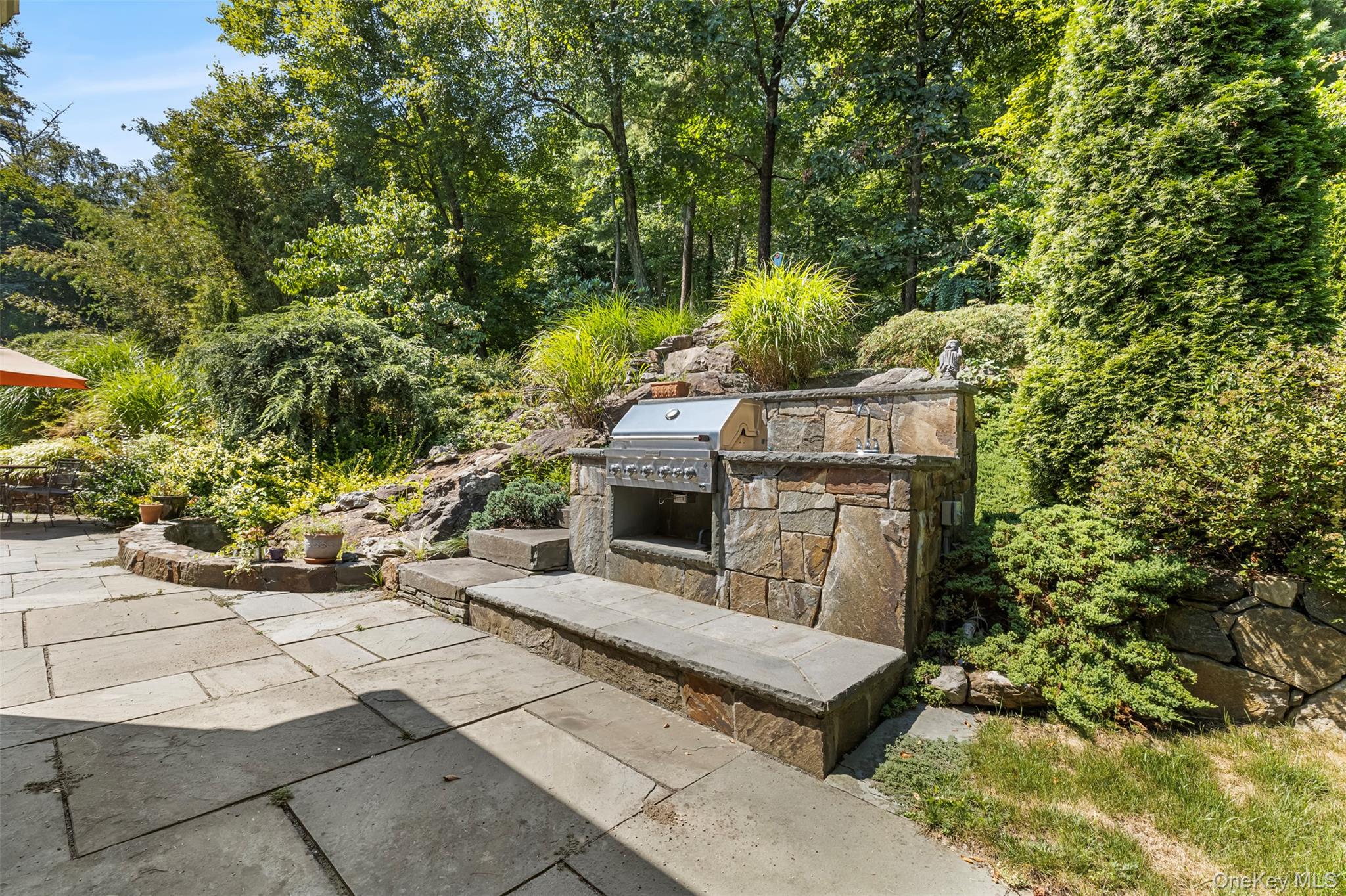 507 Croton Lake Road Bedford Corners, NY 10549 - Photo 28 of 39 a front view of a house with a yard