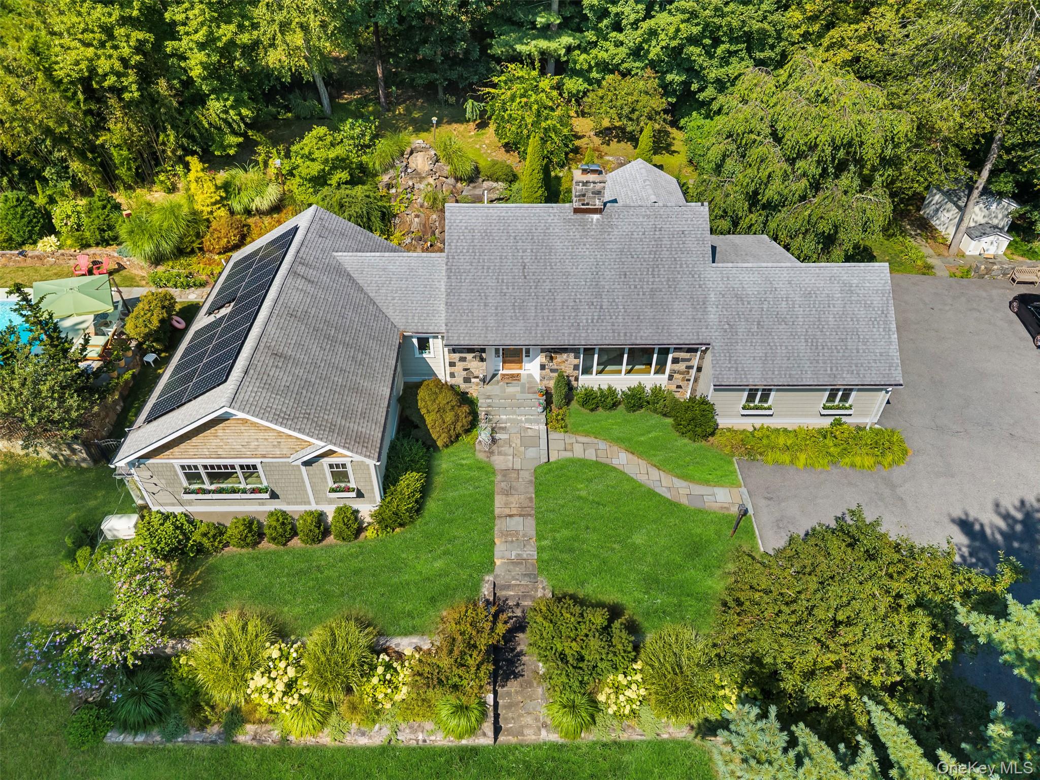 507 Croton Lake Road Bedford Corners, NY 10549 - Photo 35 of 39 a aerial view of a house with a yard and a pool