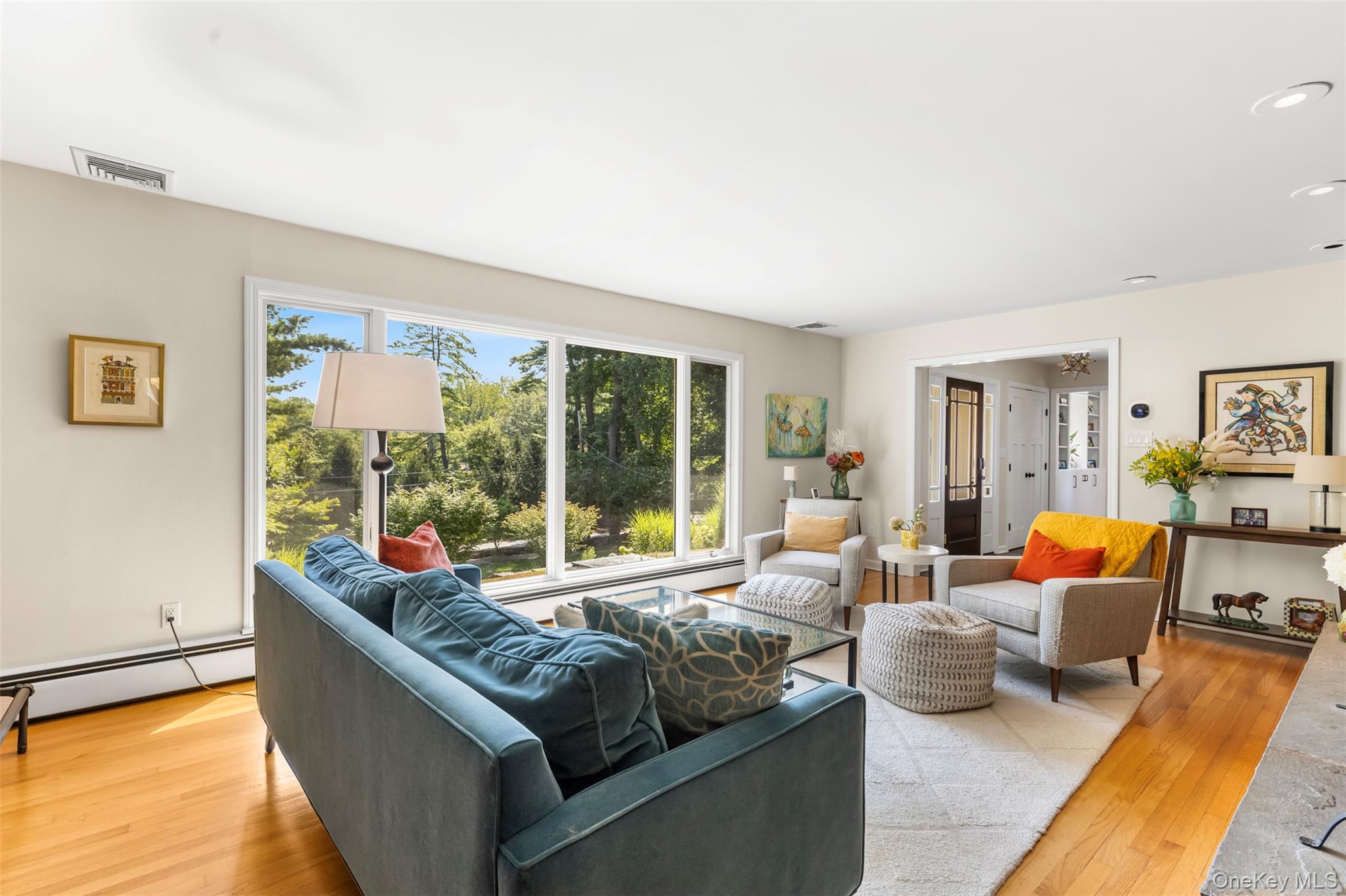 507 Croton Lake Road Bedford Corners, NY 10549 - Photo 5 of 39 a living room with furniture and a large window