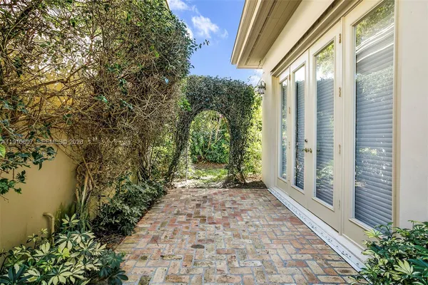 a view of a garden with pathway