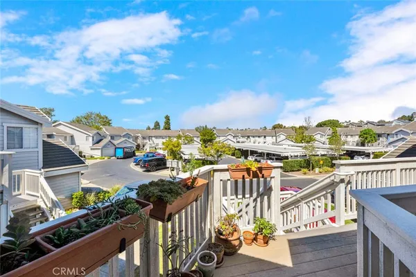 a view of a balcony with city view
