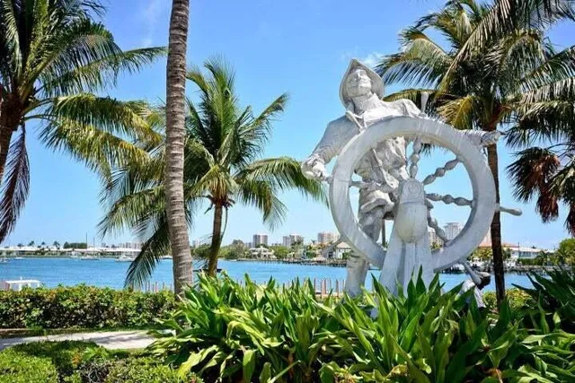 a view of outdoor space with swimming pool and lake view