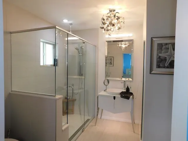 a bathroom with a shower and a tub